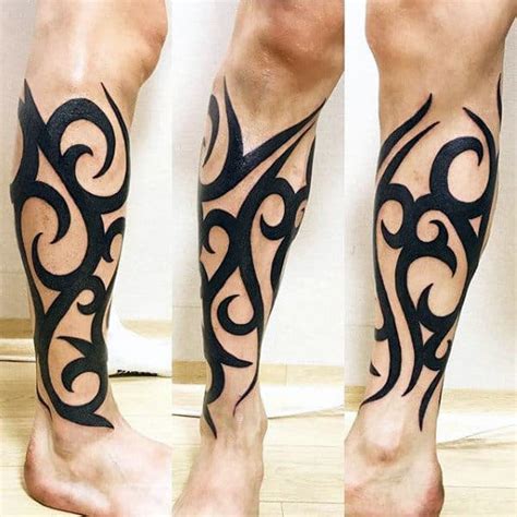 tribal tattoo for legs|tribal leg tattoos for men.